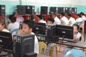 Students using computers in class